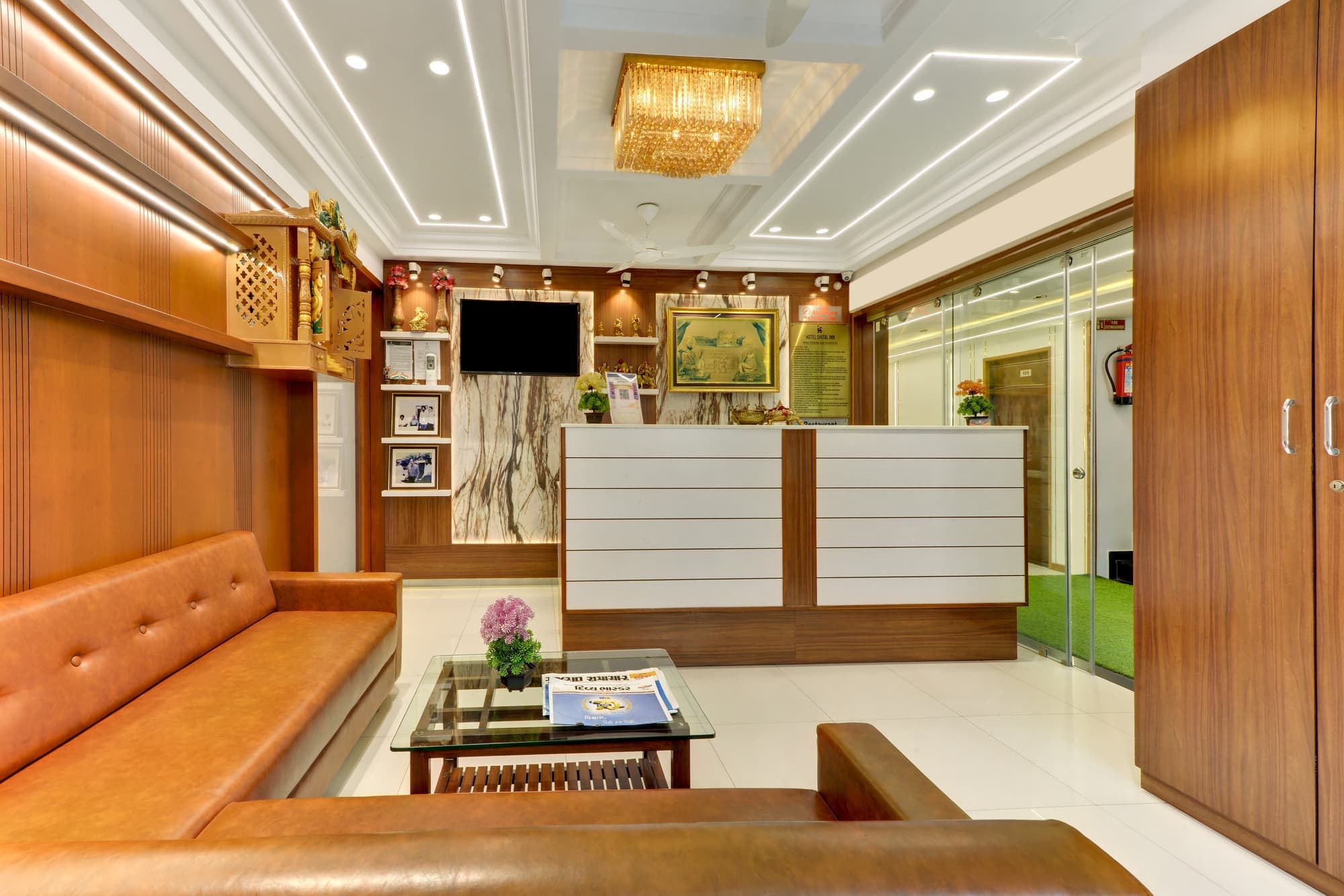 Hotel Shital Inn main reception desk with marble feature wall